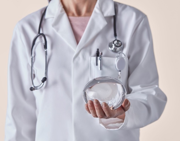A clinician holding the Allurion gastric balloon